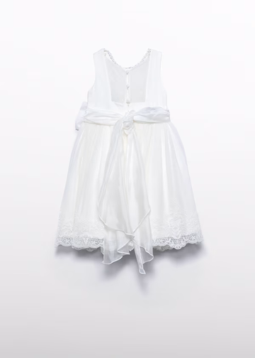 Abito tulle traforato con fiocco