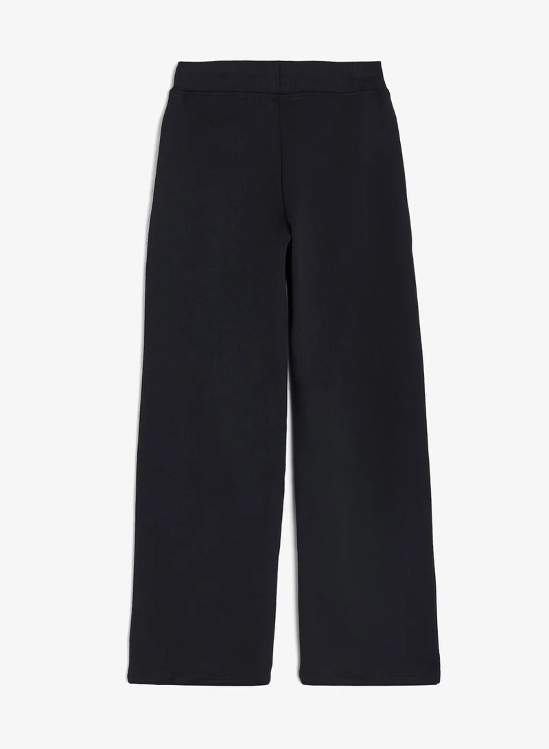 Pantalone sportivo mod. palazzo in spugna francese - Guess