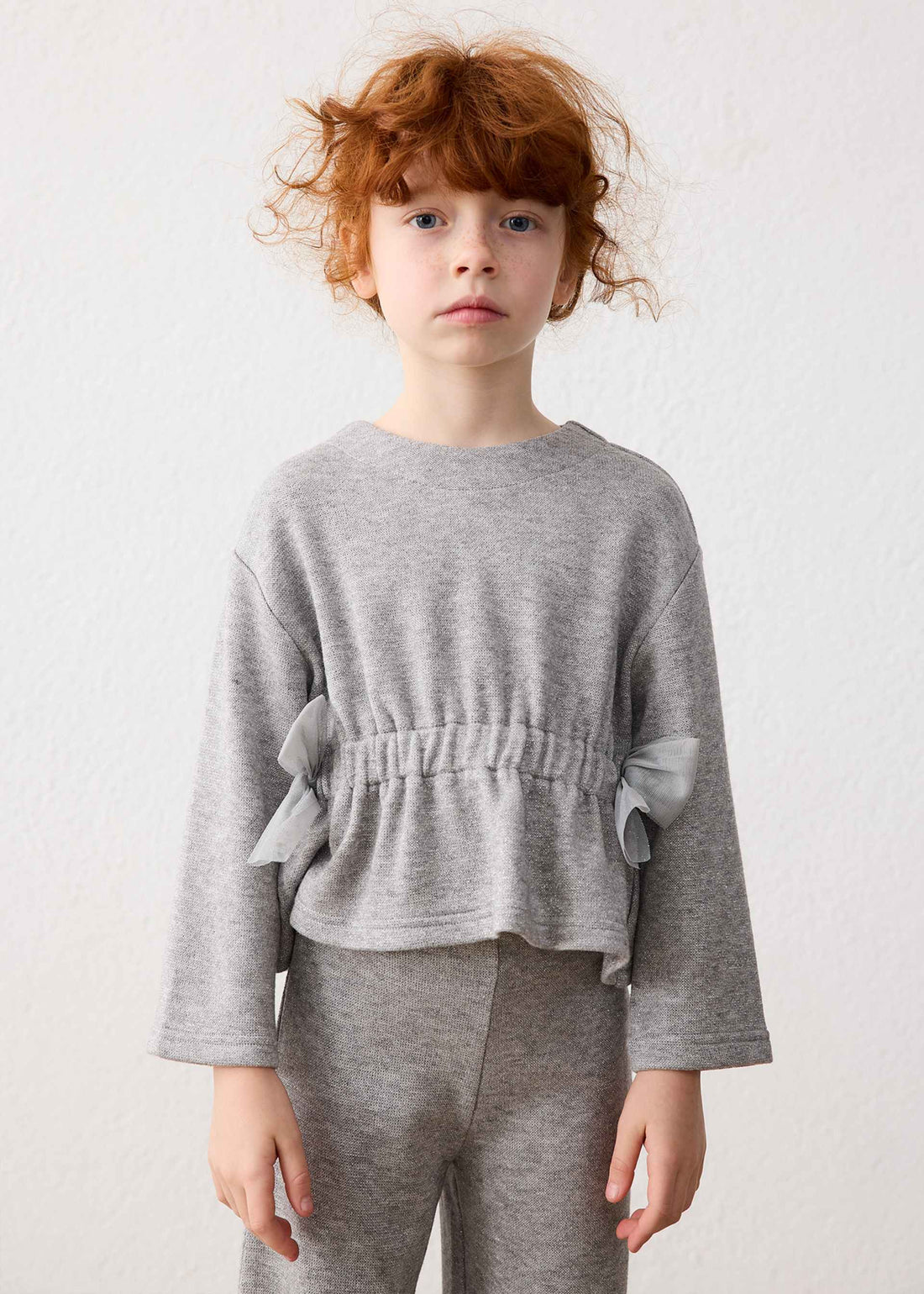 Completo pantalone e maglione fiocchi bambina