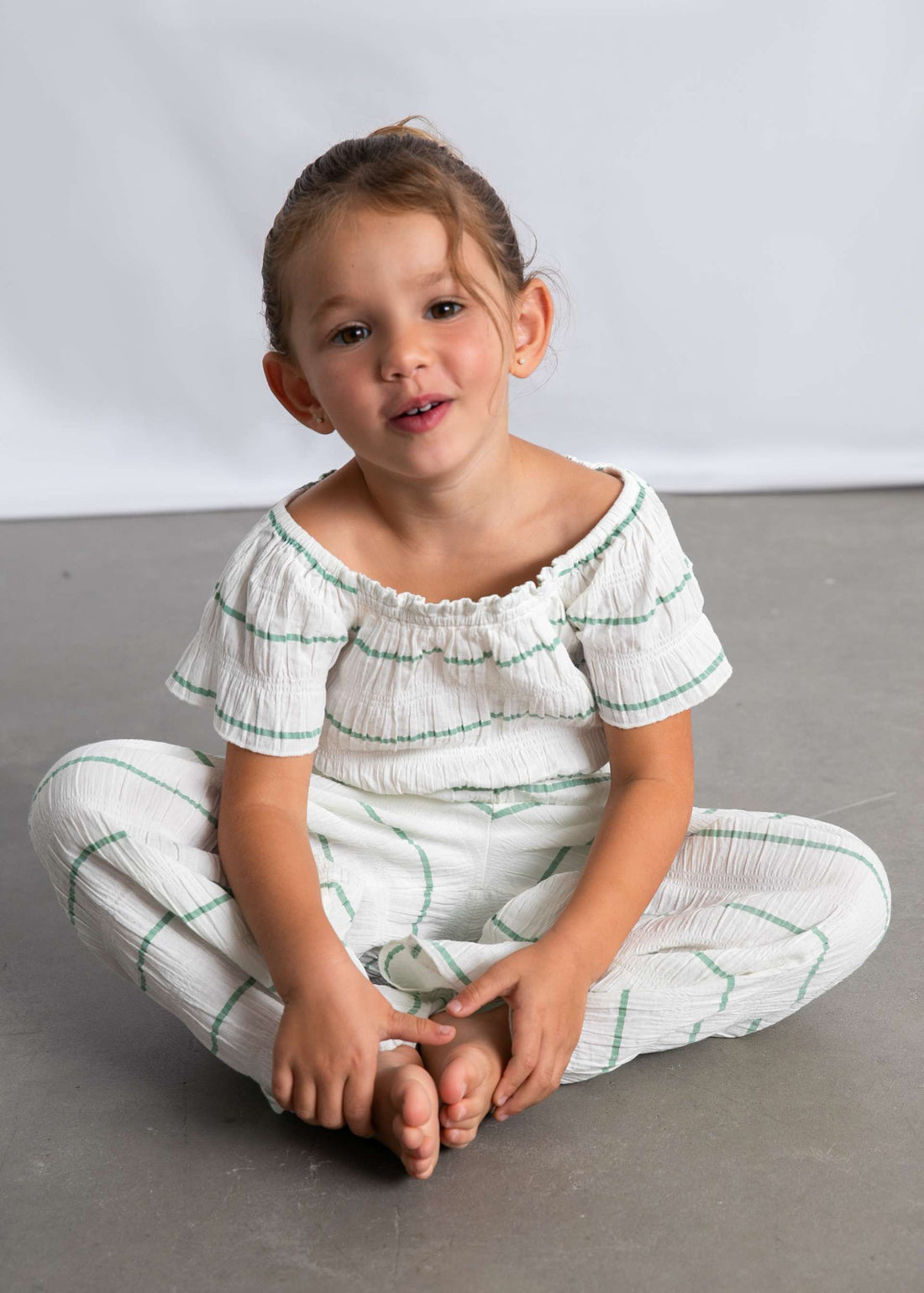 Completo pantalone e top a righe bambina