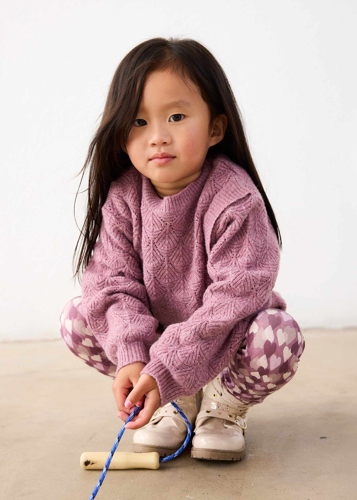 Maglione asimmetrico bambina